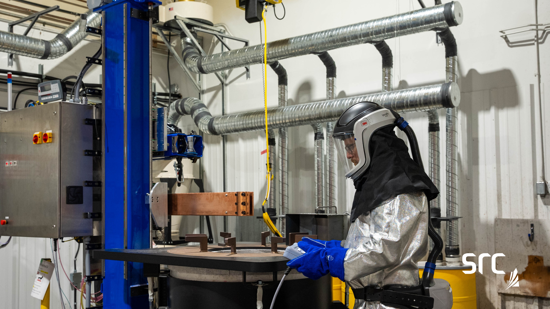 an src employee operating src's proprietary metal smelting furnace