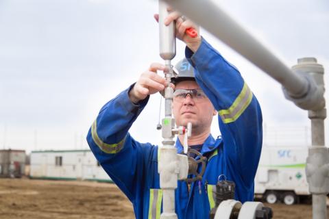 src engineer conducts well site monitoring