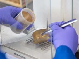 weighing sample at src geoanalytical laboratories